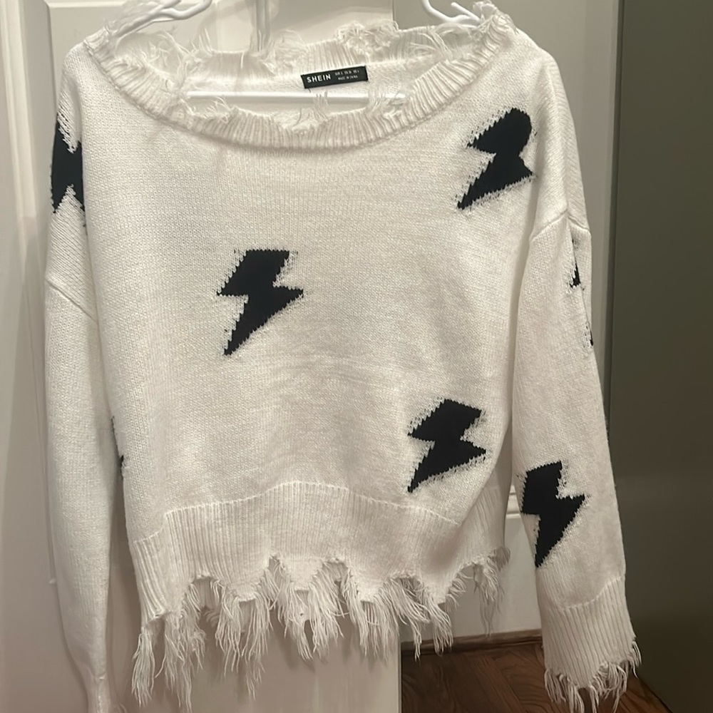 White lightning bolt sweater
